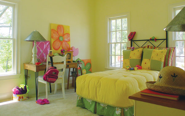 cheerful girl's bedroom with desk