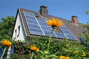 cottage style home with solar panel on the roof cottage style home with solar panel on the roof