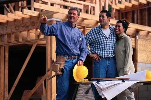 contractor talking to couple Finding a Home Building Contractor
