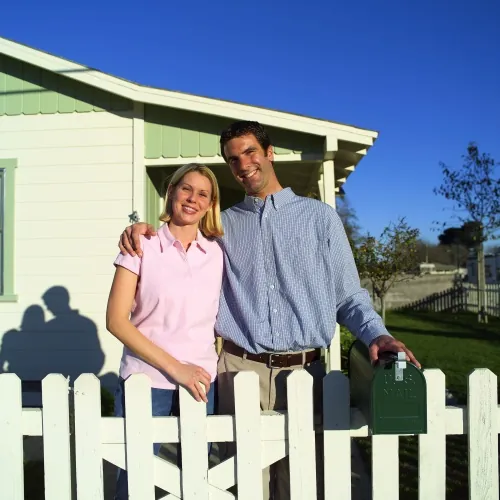 Couple Outside New Home Couple Outside New Home