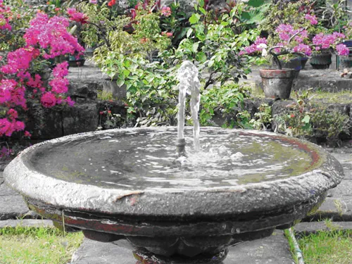 covered outdoor kitchen outdoor fountain