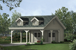 Two-car carport has storage rooms with double doors and two dormers on roof for a country style