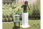 Old-fashioned wooden water pump is great for a country style or rustic home plan